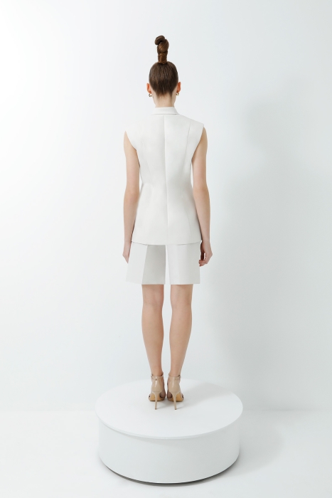 Gizia Double Ecru Suit with Tasselled Accessory Detail and Pleated Shorts. 3