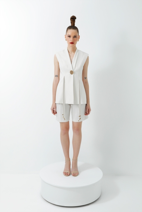 Gizia Double Ecru Suit with Tasselled Accessory Detail and Pleated Shorts. 1