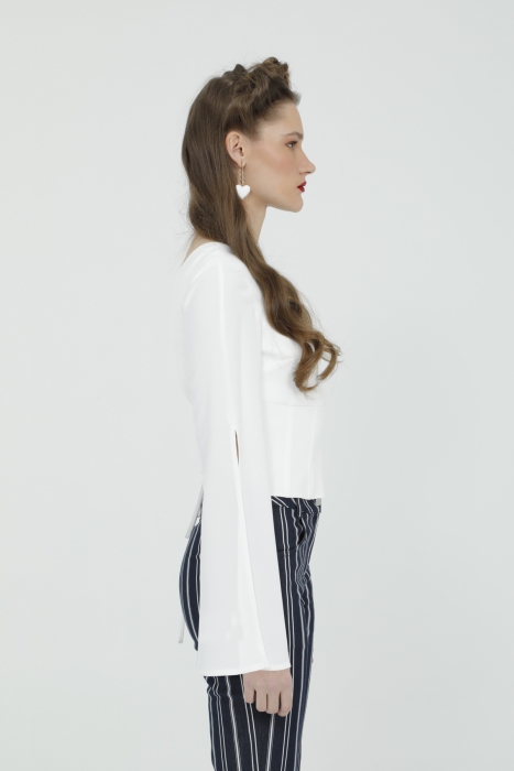Gizia Ecru Blouse with Low Cut Back and Floral Brooch. 2 Gizia Ecru Blouse with Low Cut Back and Floral Brooch. 2