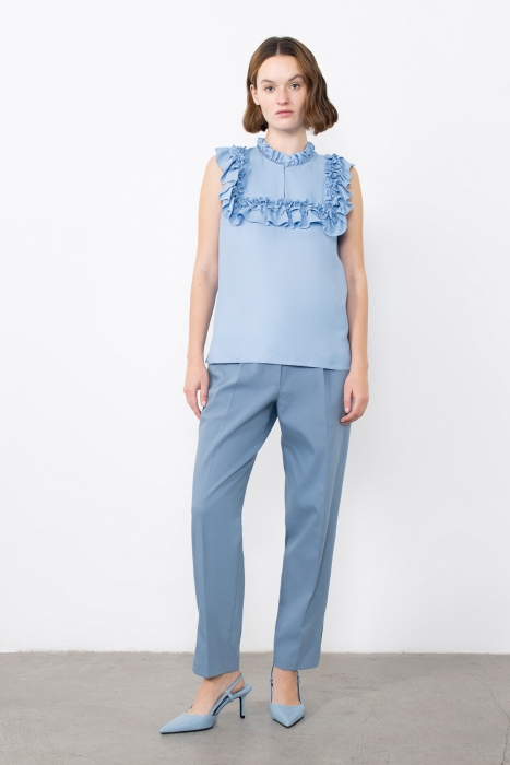 Gizia Blue Blouse With Ruffled Embroidery Detail. 1 Gizia Blue Blouse With Ruffled Embroidery Detail. 1